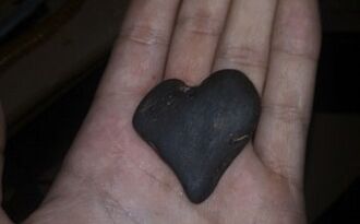 heart in the shape of a stone as an amulet of good luck