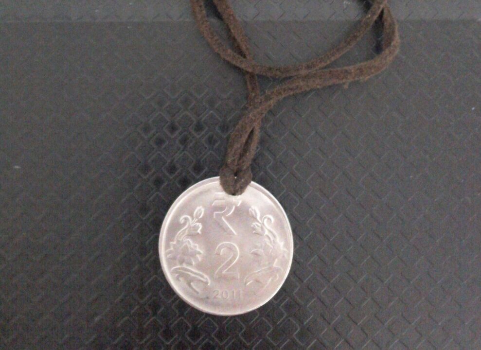 amulet coin to attract wealth