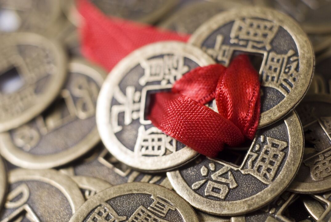 coins with red thread for money